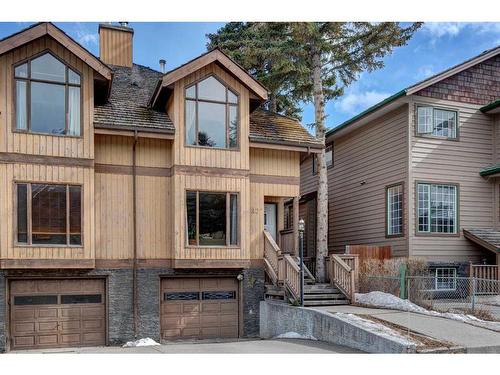 328 Squirrel Street, Banff, AB - Outdoor With Facade