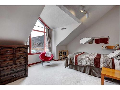 328 Squirrel Street, Banff, AB - Indoor Photo Showing Bedroom