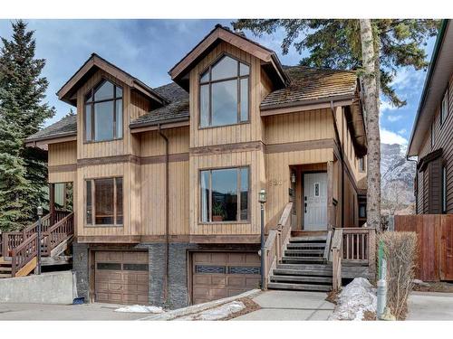 328 Squirrel Street, Banff, AB - Outdoor With Facade