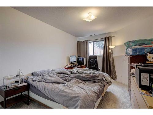 328 Squirrel Street, Banff, AB - Indoor Photo Showing Bedroom