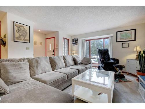 328 Squirrel Street, Banff, AB - Indoor Photo Showing Living Room