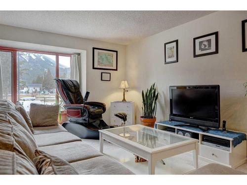 328 Squirrel Street, Banff, AB - Indoor Photo Showing Living Room