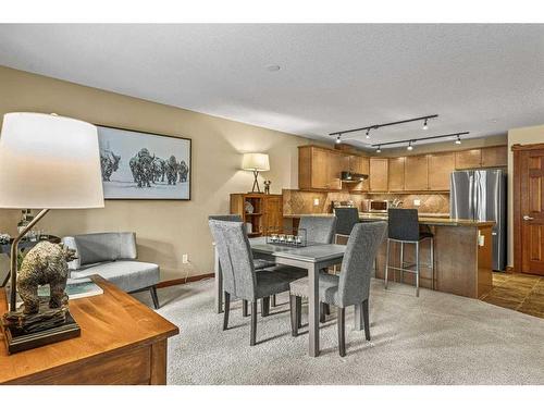 311-150 Crossbow Place, Canmore, AB - Indoor Photo Showing Dining Room