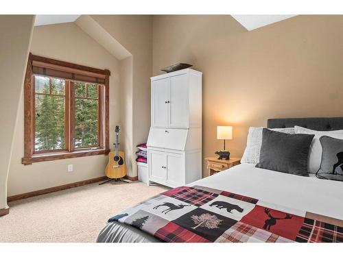 311-150 Crossbow Place, Canmore, AB - Indoor Photo Showing Bedroom