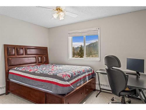 217-115 Elk Run Boulevard Se, Canmore, AB - Indoor Photo Showing Bedroom