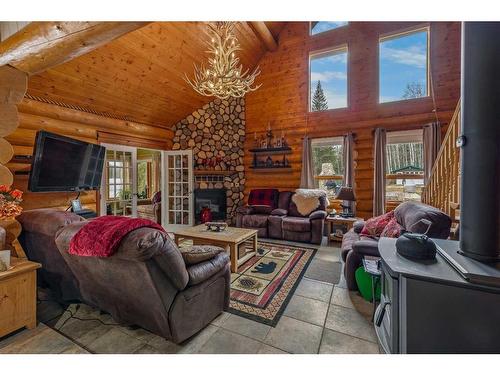 10-53114 Range Road 194, Rural Yellowhead County, AB - Indoor Photo Showing Living Room With Fireplace