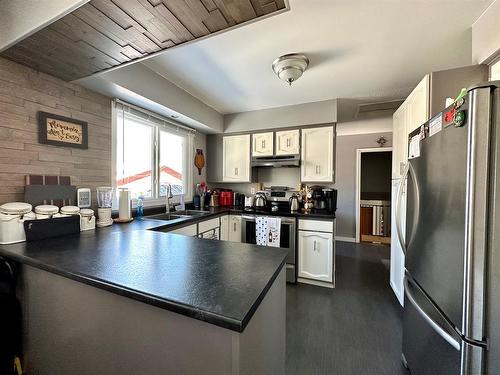 93 Feero Drive, Whitecourt, AB - Indoor Photo Showing Kitchen With Double Sink