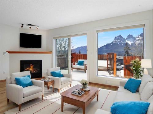 115 Moraine Road, Canmore, AB - Indoor Photo Showing Living Room With Fireplace