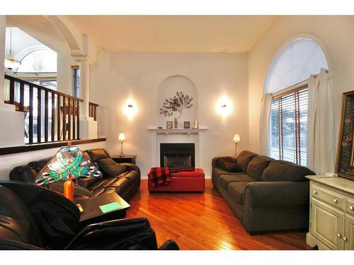 215 Tocher Avenue, Hinton, AB - Indoor Photo Showing Living Room With Fireplace