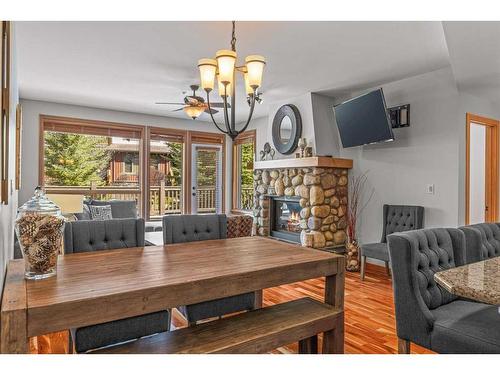 309-701 Benchlands Trail, Canmore, AB - Indoor With Fireplace