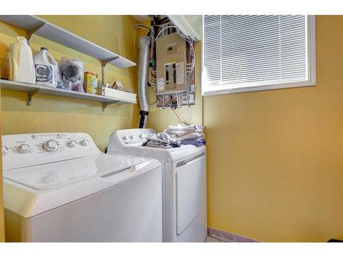 161 Coyote Way, Canmore, AB - Indoor Photo Showing Laundry Room