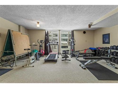 6-124 Beaver Street, Banff, AB - Indoor Photo Showing Gym Room