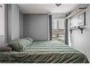 6-124 Beaver Street, Banff, AB  - Indoor Photo Showing Bedroom 