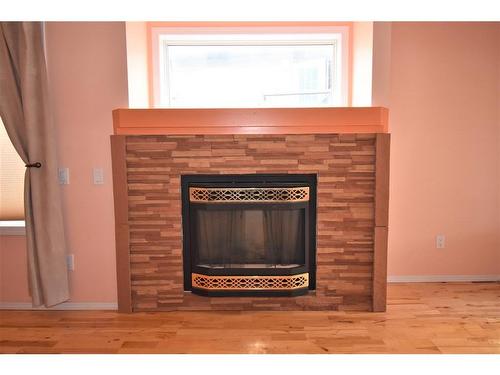 145 Hood Street, Hinton, AB - Indoor With Fireplace