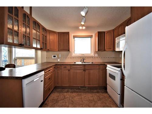 145 Hood Street, Hinton, AB - Indoor Photo Showing Kitchen With Double Sink
