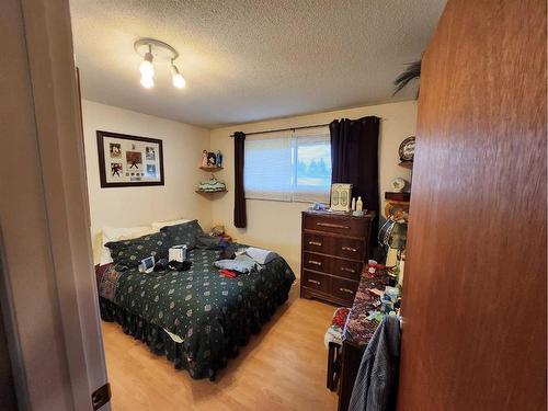 716 6 Avenue, Fox Creek, AB - Indoor Photo Showing Bedroom