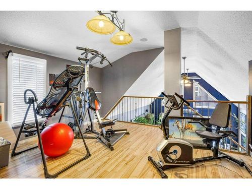 412 Cougar Street, Banff, AB - Indoor Photo Showing Gym Room
