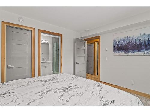14-428 Marten Street, Banff, AB - Indoor Photo Showing Bedroom