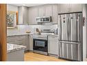 14-428 Marten Street, Banff, AB  - Indoor Photo Showing Kitchen With Upgraded Kitchen 
