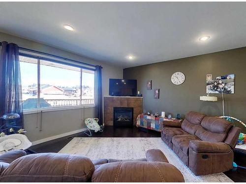 4140 15 Avenue, Edson, AB - Indoor Photo Showing Living Room With Fireplace