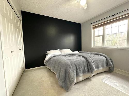 4 Ravine Drive, Whitecourt, AB - Indoor Photo Showing Bedroom