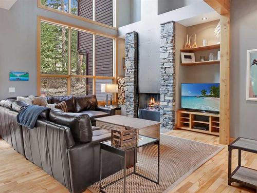 4-124 Stonecreek Road, Canmore, AB - Indoor With Fireplace
