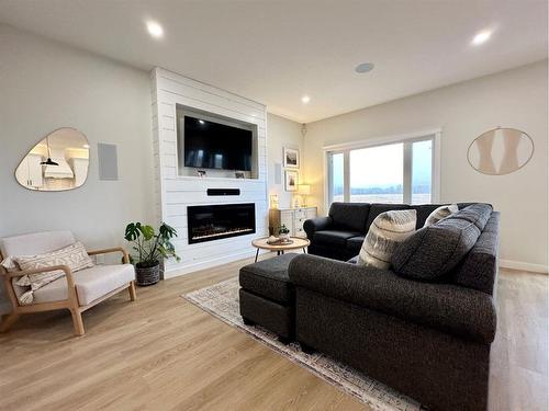 46 Riverdale Bend, Whitecourt, AB - Indoor Photo Showing Living Room With Fireplace