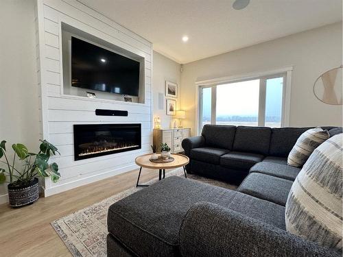 46 Riverdale Bend, Whitecourt, AB - Indoor Photo Showing Living Room With Fireplace