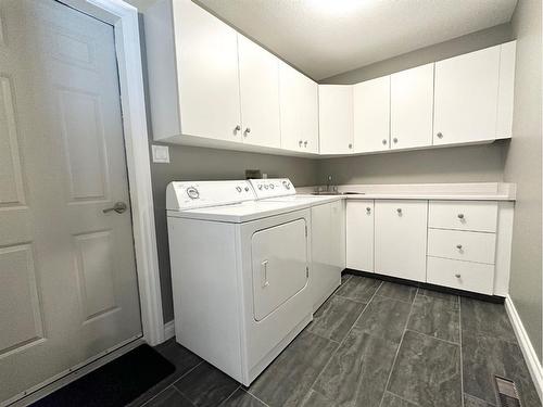 29, 593037 Range Road 122, Rural Woodlands County, AB - Indoor Photo Showing Laundry Room