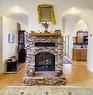 5502 17 Avenue, Edson, AB  - Indoor Photo Showing Living Room With Fireplace 