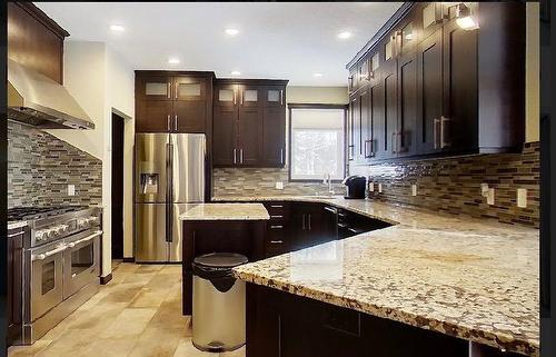 29 594028 Range Road 125, Rural Woodlands County, AB - Indoor Photo Showing Kitchen With Upgraded Kitchen