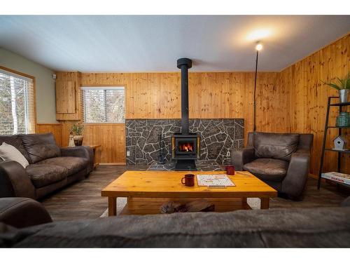 1671 Pine Drive, Calling Lake, AB - Indoor Photo Showing Living Room With Fireplace
