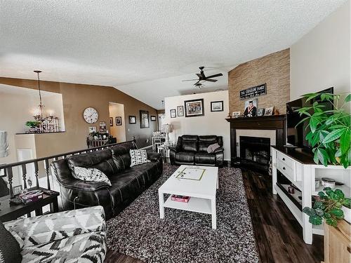 10 Park Drive, Whitecourt, AB - Indoor Photo Showing Living Room With Fireplace