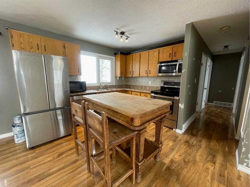 16 Centenial Crescent, Swan Hills, AB - Indoor Photo Showing Kitchen With Stainless Steel Kitchen With Double Sink