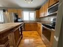 16 Centenial Crescent, Swan Hills, AB  - Indoor Photo Showing Kitchen With Double Sink 