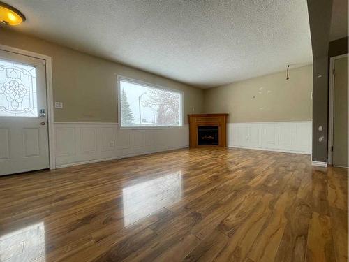 16 Centenial Crescent, Swan Hills, AB - Indoor With Fireplace