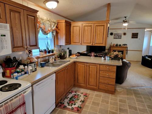 207 4A Street, Fox Creek, AB - Indoor Photo Showing Kitchen With Double Sink