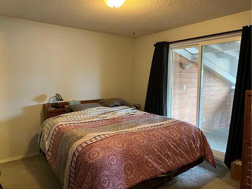 708 8 Street, Fox Creek, AB - Indoor Photo Showing Bedroom