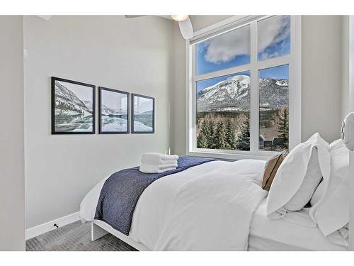 106-1106 Bow Valley Trail, Canmore, AB - Indoor Photo Showing Bedroom