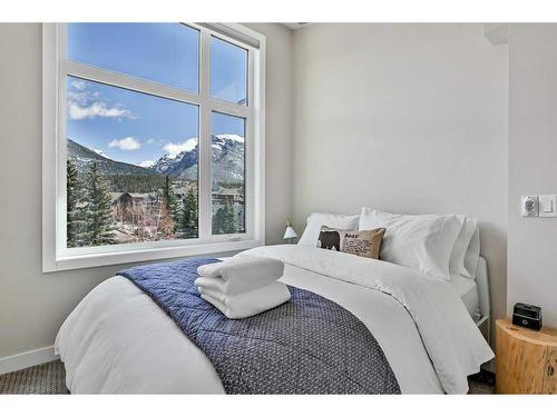 106-1106 Bow Valley Trail, Canmore, AB - Indoor Photo Showing Bedroom