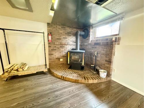 51 Harolds Hollow, Whitecourt, AB - Indoor With Fireplace