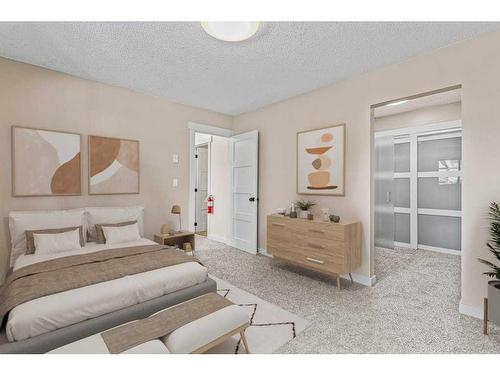 B-419 Marten Street, Banff, AB - Indoor Photo Showing Bedroom