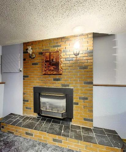 5908 9 Avenue, Edson, AB - Indoor With Fireplace