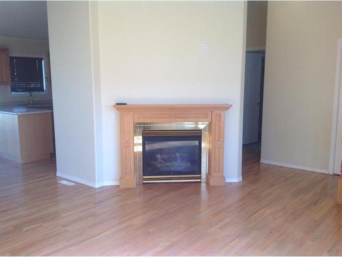 6 Flasha Lane, Whitecourt, AB - Indoor Photo Showing Living Room With Fireplace