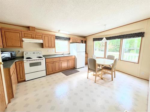 124 Allen Drive, Rural Athabasca County, AB - Indoor Photo Showing Kitchen With Double Sink