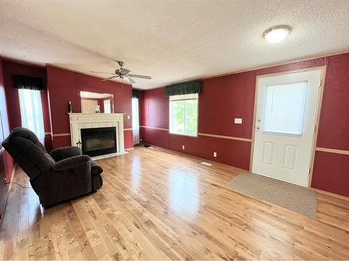 124 Allen Drive, Rural Athabasca County, AB - Indoor Photo Showing Living Room With Fireplace
