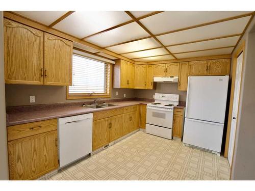 174 Wilson Avenue, Hinton, AB - Indoor Photo Showing Kitchen With Double Sink