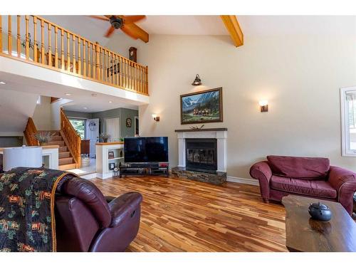 4705 Mountain Road, Brule, AB - Indoor Photo Showing Living Room With Fireplace