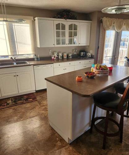 502 8 Street, Fox Creek, AB - Indoor Photo Showing Kitchen With Double Sink