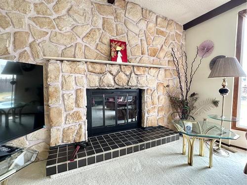 16 Walker Avenue, Swan Hills, AB - Indoor With Fireplace